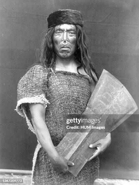 Edward S. Curits Native American Indians - Hakalahl, Nakoaktok chief, holding copper Wanistakila circa 1914.