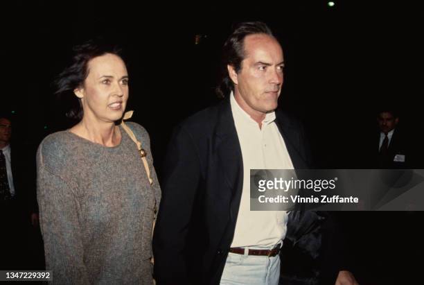 Actor Powers Boothe and wife Pamela Cole attend the premiere of 'Geronimo-An American Legend' on December 2, 1993 at the Academy Theater in New York...