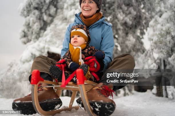 Infant Sleigh Riding Baby Sled Photos and Premium High Res Pictures - Getty Images