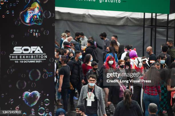 Attendees make long lines to see several exhibitions during the first day of the SOFA 2021, a fair aimed to the geek audience in Colombia that mixes...