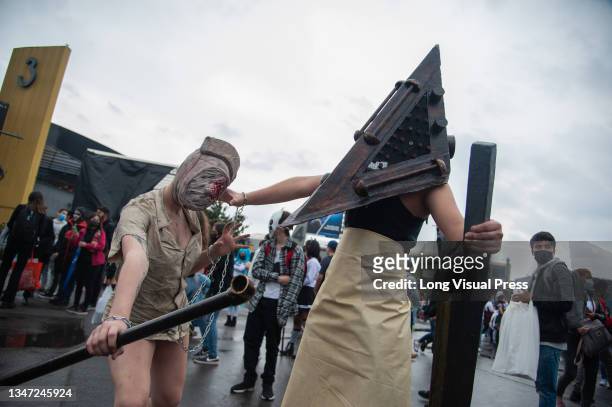 Couple cosplays characters from Horror videogame franchise Silent Hill, Pyramid Head and Nurse during the first day of the SOFA 2021, a fair aimed to...
