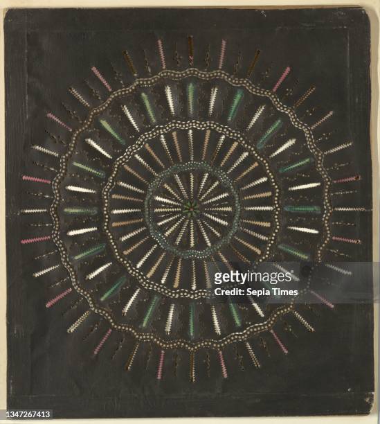 Etruscan Wheel, Cut paper on wood frame, Magic lantern slide, optical toy. On black field, circular design composed of four concentric series of rays...