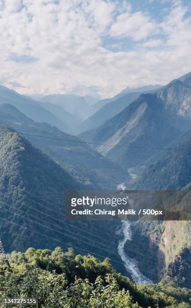 scenic view of mountains against sky,sikkim,india - sikkim fotografías e imágenes de stock