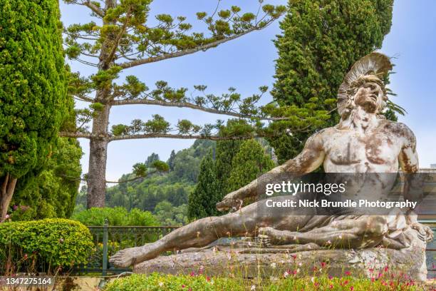 statue of dying achilles in corfu, greece. - expensive statue stockfoto's en -beelden