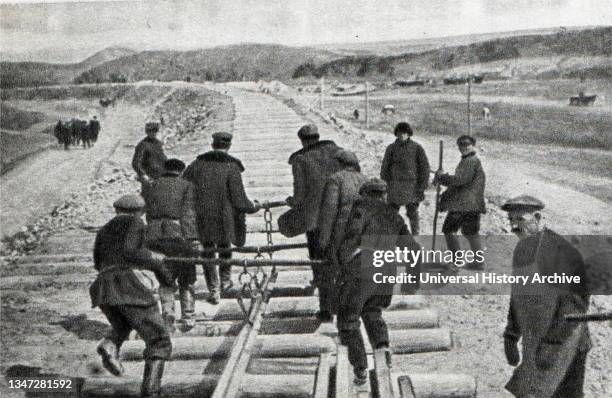 Soviet Russian construction workes building Magnitogorsk Iron and Steel Works.