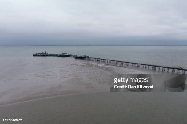 The train makes its way along Southend Pier, the longest pleasure pier in the world, on October 18, 2021 in Southend, England. The campaign to make...