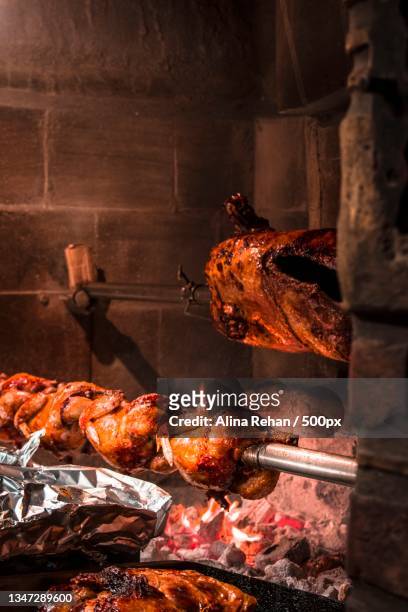 high angle view of meat on barbecue grill - am spieß gebraten stock-fotos und bilder