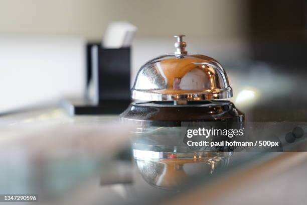 close-up of service bell on table,wien,austria - hotel bell stockfoto's en -beelden