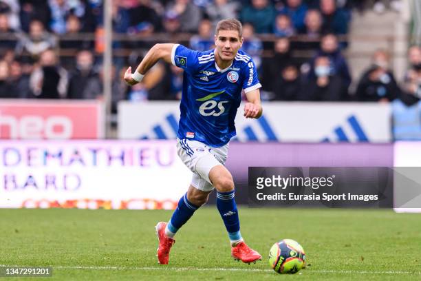 Maxime Le Marchand of RC Strasbourg runs with the ball during the Ligue 1 Uber Eats match between RC Strasbourg and AS Saint-Etienne at Stade de la...