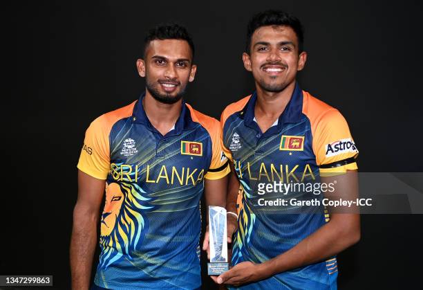 Dasun Shanaka and Maheesh Theekshana of Sri Lanka pose for a photo following the ICC Men's T20 World Cup match between Sri Lanka and Namibia at...