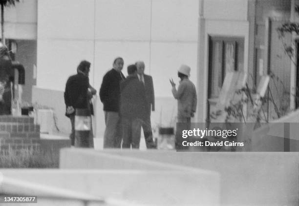 Police officers and Ministry of Interior officials attempt to negotiate with Palestinian terrorist group Black September for the release of hostages...