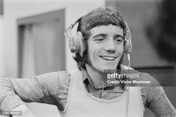 English footballer Kevin Keegan of Liverpool FC in a recording studio, UK, 15th October 1972. He released a single titled 'It Ain't Easy' that year.