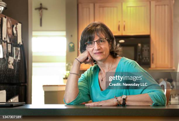 Denise Crean is shown in her Farmingville, New York home, on October 14, 2021. Crean has been participating in a Stony Brook Medicine support group...