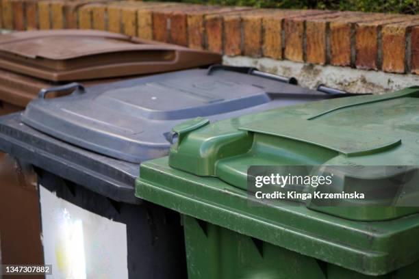 recycling household bins - wheelie bin stock pictures, royalty-free photos & images