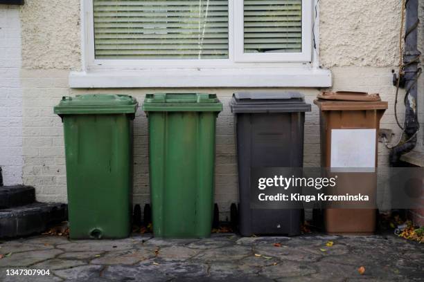 recycling bins - wheeled garbage can stock pictures, royalty-free photos & images