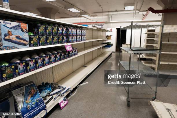 Mostly empty shelves are seen at a Sears tore on October 18, 2021 in the Flatbush neighborhood of Brooklyn borough in New York City. Sears, which...