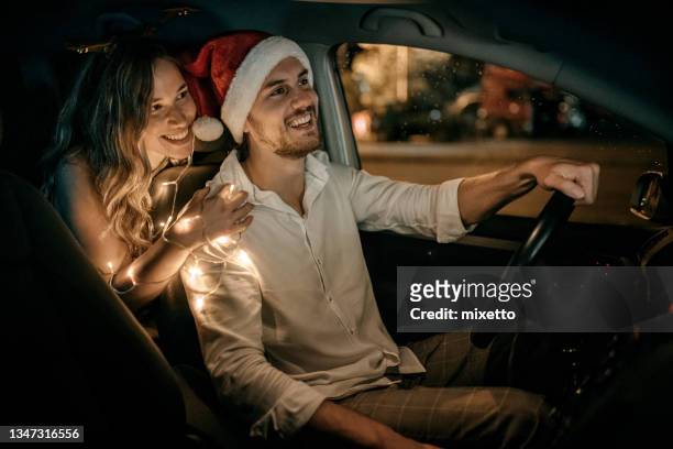 get ready for new year's eve - christmas driving stockfoto's en -beelden