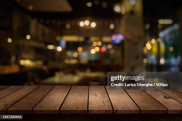 close-up of wooden table in restaurant - casino interior photos et images de collection