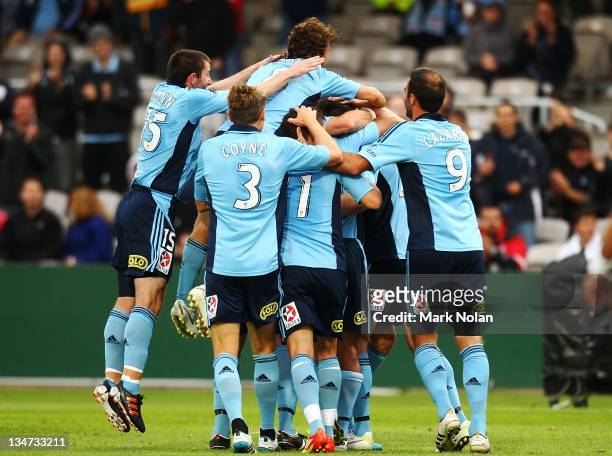 Sydney Celebrate a goal by Brett Emerton during the round nine A-League match between Sydney FC and the Brisbane Roar at WIN Jubilee Stadium on...