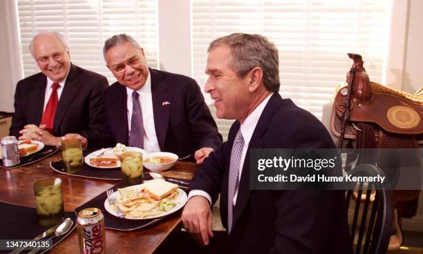 Chief of Staff Andy Card, Vice President elect Dick Cheney, Gen. Colin Powell and President elect George W. Bush share lunch at Bush's ranch after...