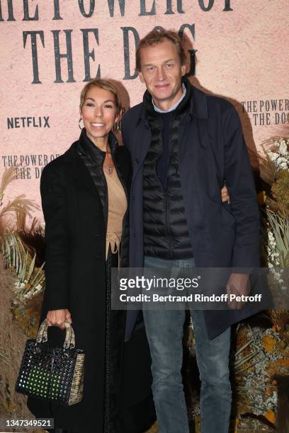 Mathilde Favier and Nicolas Altmayer attend the "The Power of the Dog" Premiere at Cinema UGC Normandie on October 18, 2021 in Paris, France.