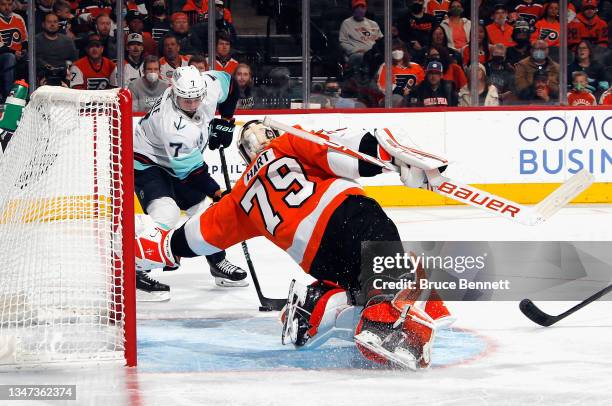 Carter Hart of the Philadelphia Flyers makes the first period save on Jordan Eberle of the Seattle Kraken at the Wells Fargo Center on October 18,...