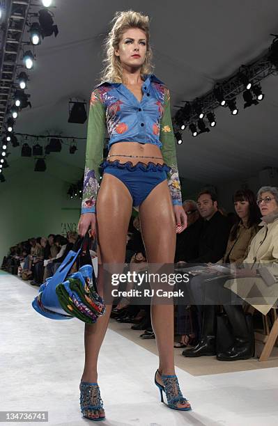 Model wearing Zang Toi Spring 2004 during Mercedes-Benz Fashion Week Spring 2004 - Zang Toi - Runway at Josephine Tent, Bryant Park in New York City,...