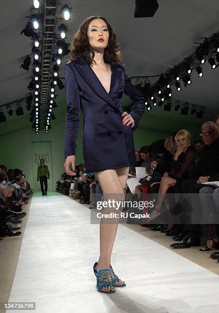 Model Ein Tan Zang Toi Spring 2004 during Mercedes-Benz Fashion Week Spring 2004 - Zang Toi - Runway at Josephine Tent, Bryant Park in New York City,...