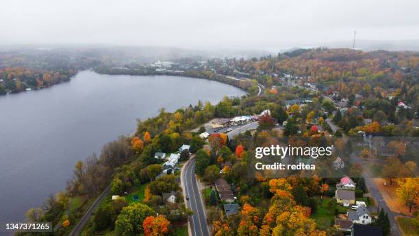 autumn, aerial view, on a foggy morning over muskoka . ontario, canada - muskoka stock pictures, royalty-free photos & images
