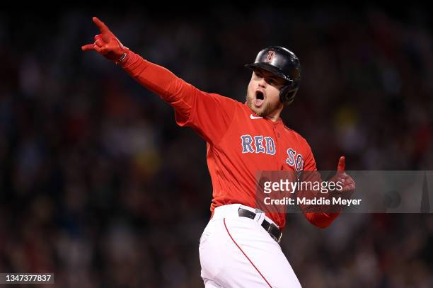 Christian Arroyo of the Boston Red Sox reacts after hitting a two run home run against the Houston Astros in the third inning of Game Three of the...