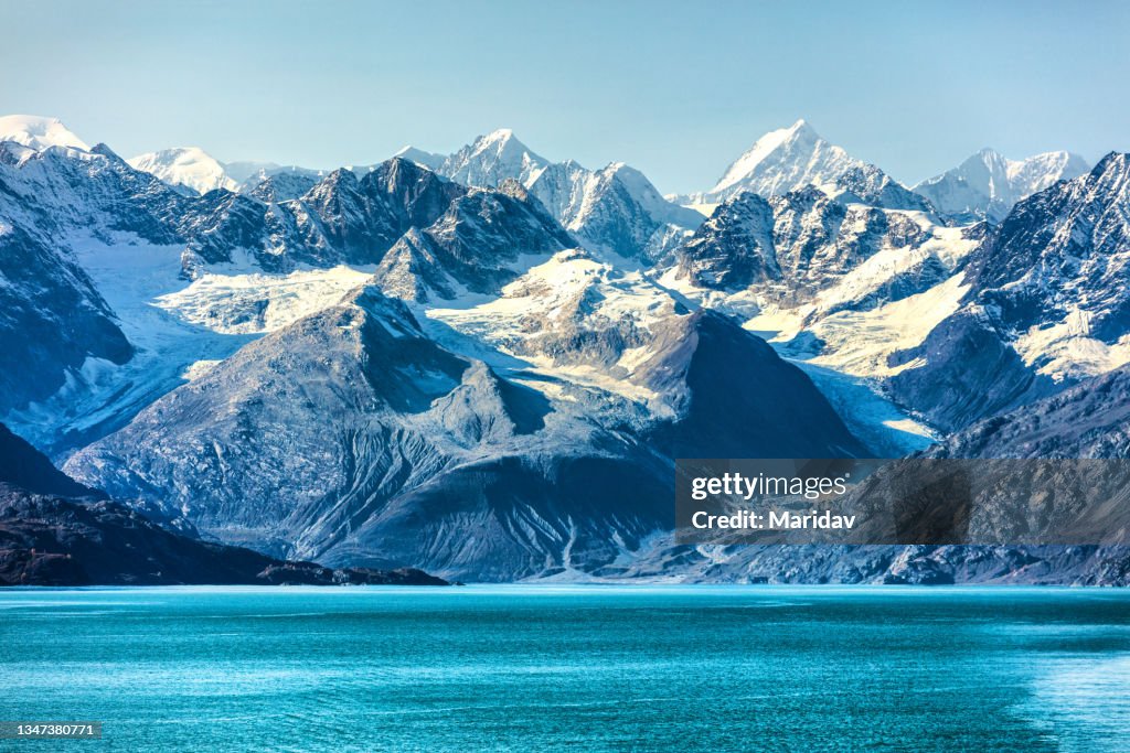 Glacier Bay cruise - Alaska nature landscape. Glacier Bay National Park in Alaska, USA. Scenic view from cruise ship vacation Alaska travel showing mountain peaks and glaciers.