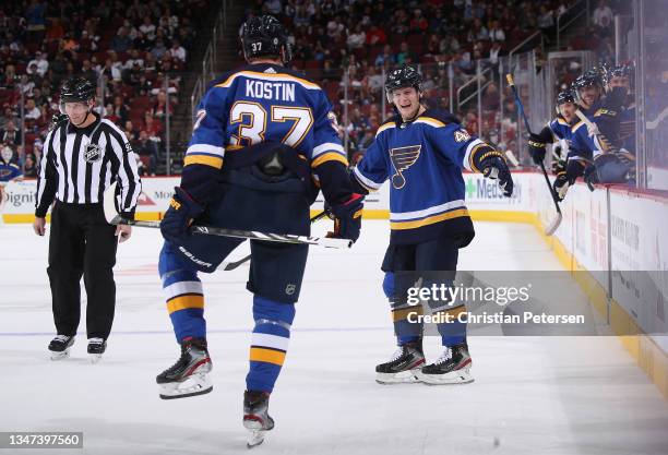 Klim Kostin of the St. Louis Blues celebrates with Torey Krug after scoring a goal during the second period of the NHL game against the Arizona...