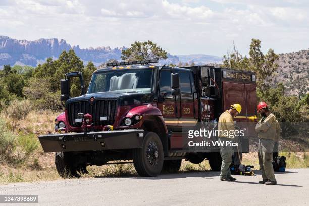 Heavy-duty International HV firefighting water tender truck on a the Pack Creek Fire in Utah.