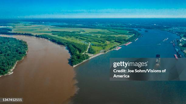 Confluence of Missouri. And Mississippi rivers near St. Louis Mo. And Alton, Illinois view from Drone shows barges.