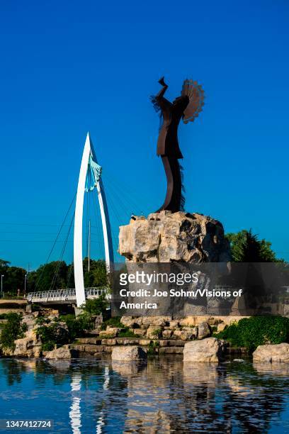 Keeper of the Plains Indian sculpture, Wichita, Kansas on confluence of Little and Big Arkansas Rivers.