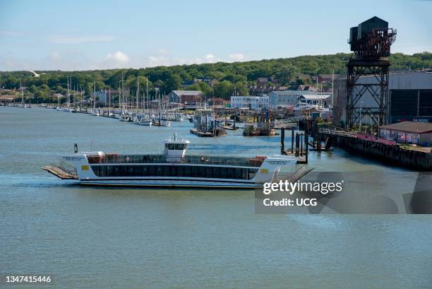 Cowes, Isle of Wight, England, UK, Vehicle and passenger ferry underway between East and West Cowes on the River Medina.