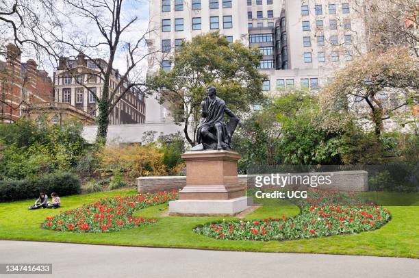 Statue of Robert Burns in Victoria Embankment Gardens in London.