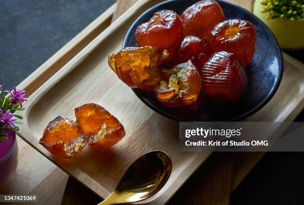 jujube compote in a ceramic dish - azufaifo fotografías e imágenes de stock