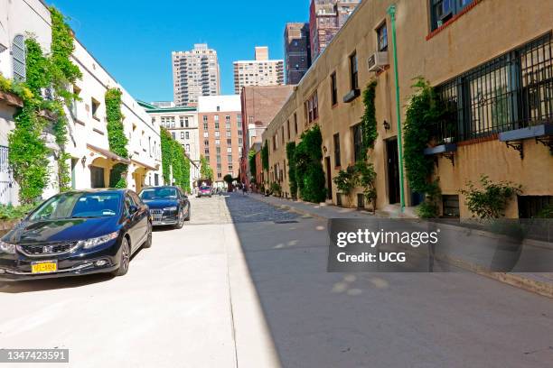 Washington Mews, private gated, townhouses formally stables, street in New York City off Fifth Avenue.