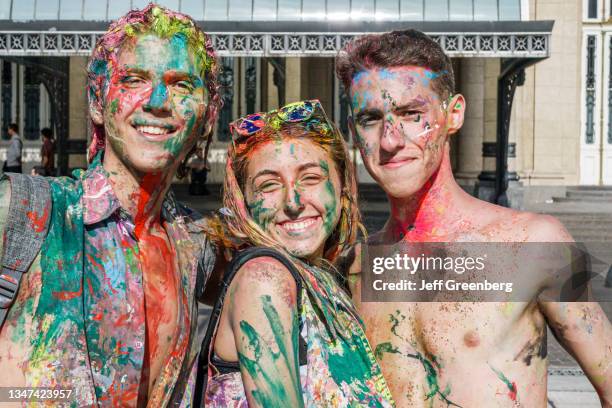 Argentina, Buenos Aires, Plaza Lavalle Square, traditional end of school paint throwing party.