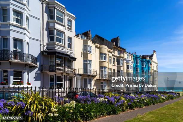 England, East Sussex, Brighton, Kemptown, The New Steine Gardens and Colourful Hotels and Residential Buildings.
