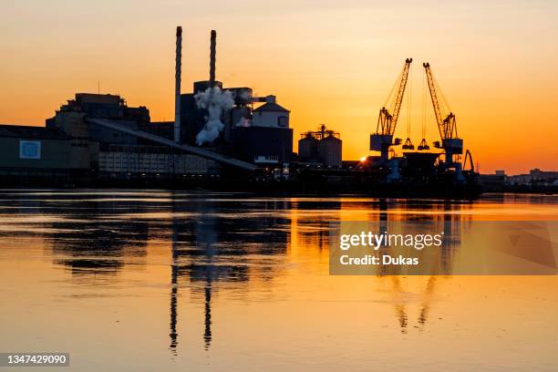 England, London, Docklands, North Woolwich, Royal Docks, Tate and Lyle Sugar Industrial Plant at Dawn.