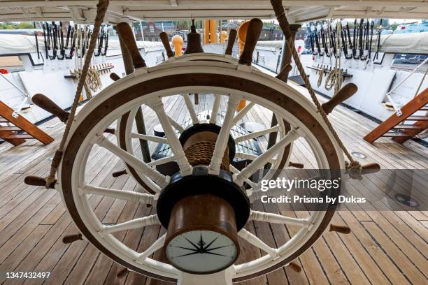England, Kent, Chatham, The Historic Dockyard, The Steering Wheel of The Sailing Sloop HMS Gannet.