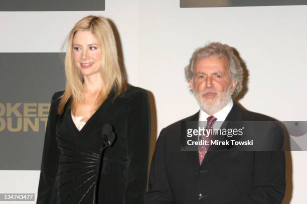 Mira Sorvino and the president of the Academy Sid Ganis