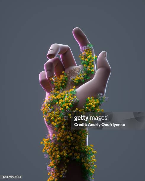 futuristic human hand covered by flowers pattern. - roboter hand stock-fotos und bilder