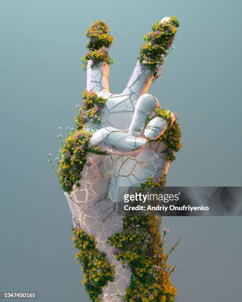 futuristic human hand covered by flowers pattern. - android stock pictures, royalty-free photos & images