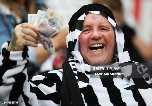 Newcastle United fans are seen during the Premier League match between Newcastle United and Tottenham Hotspur at St. James Park on October 17, 2021...