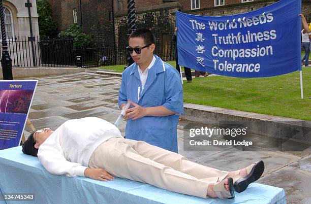 Display of Torture methods used by the Chinese Government on followers of Falun Gong, the Chinese meditation and exercise system.