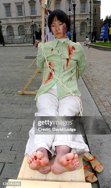 Display of Torture methods used by the Chinese Government on followers of Falun Gong, the Chinese meditation and exercise system.