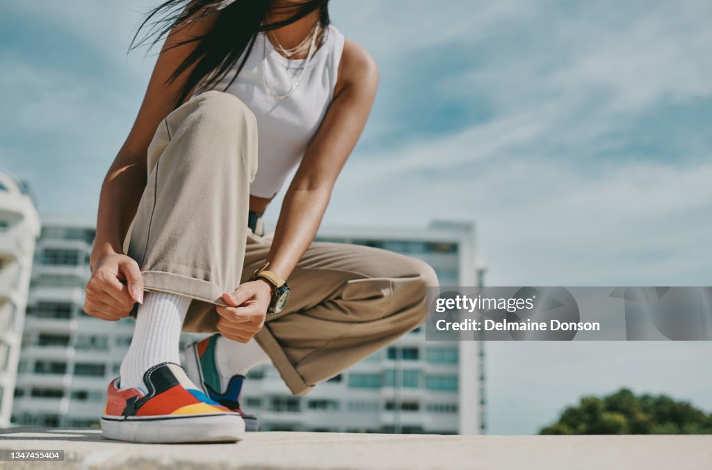 Shot of an unrecognizable woman spending a day in the city